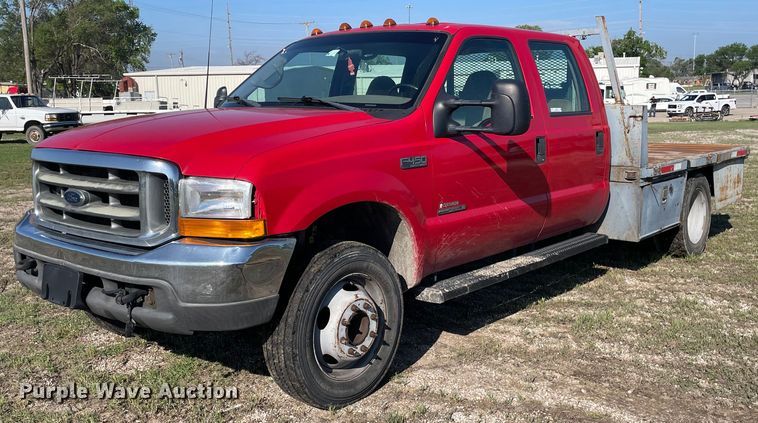 image for item LY9607 2000 Ford F450 Super Duty  Crew Cab flatbed pickup truck