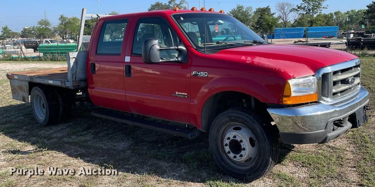 image for item LY9607 2000 Ford F450 Super Duty  Crew Cab flatbed pickup truck