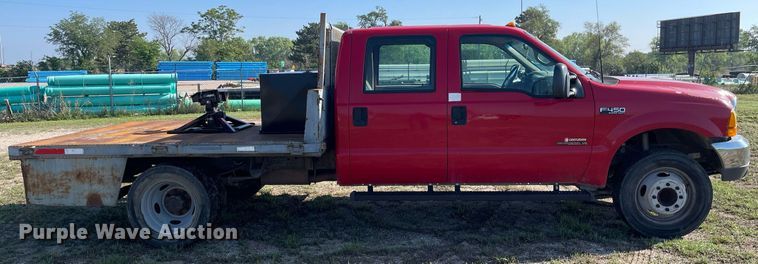 image for item LY9607 2000 Ford F450 Super Duty  Crew Cab flatbed pickup truck