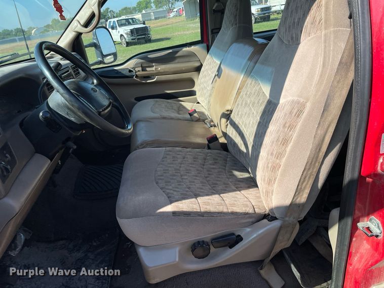 image for item LY9607 2000 Ford F450 Super Duty  Crew Cab flatbed pickup truck