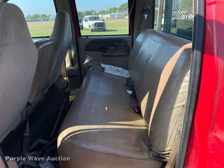 image for item LY9607 2000 Ford F450 Super Duty  Crew Cab flatbed pickup truck