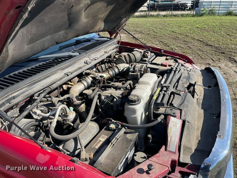 image for item LY9607 2000 Ford F450 Super Duty  Crew Cab flatbed pickup truck