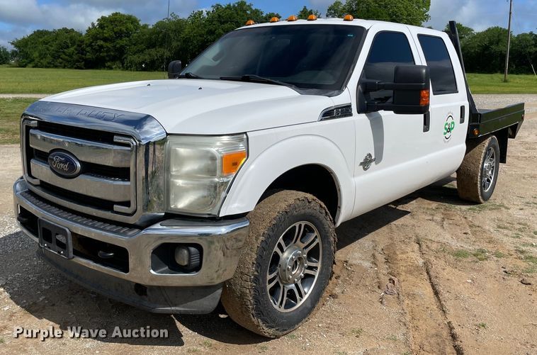 image for item MR9081 2012 Ford F250 Super Duty  Crew Cab flatbed pickup truck