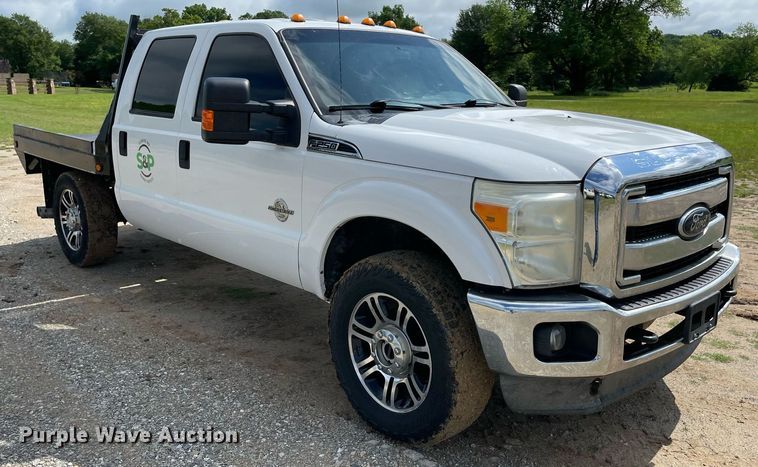 image for item MR9081 2012 Ford F250 Super Duty  Crew Cab flatbed pickup truck