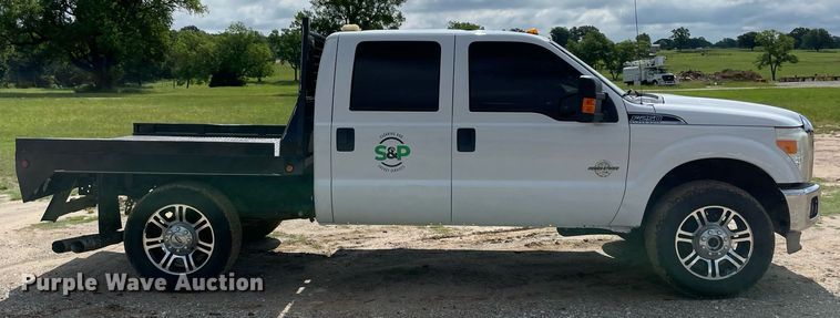 image for item MR9081 2012 Ford F250 Super Duty  Crew Cab flatbed pickup truck