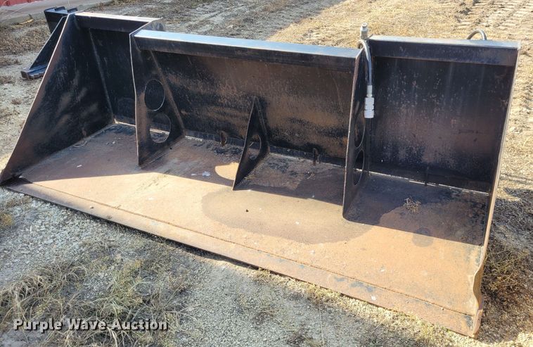 image for item NX9482 8'W skid steer rock spreading bucket