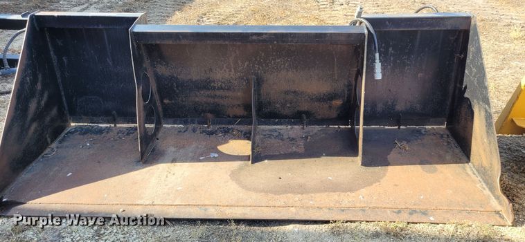 image for item NX9482 8'W skid steer rock spreading bucket