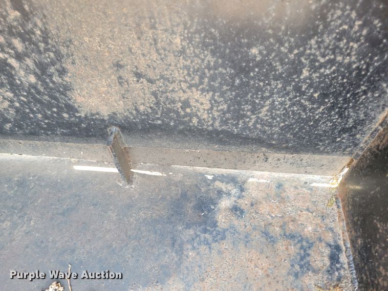 image for item NX9482 8'W skid steer rock spreading bucket