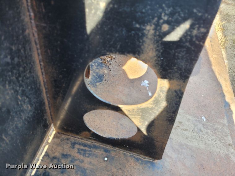 image for item NX9482 8'W skid steer rock spreading bucket