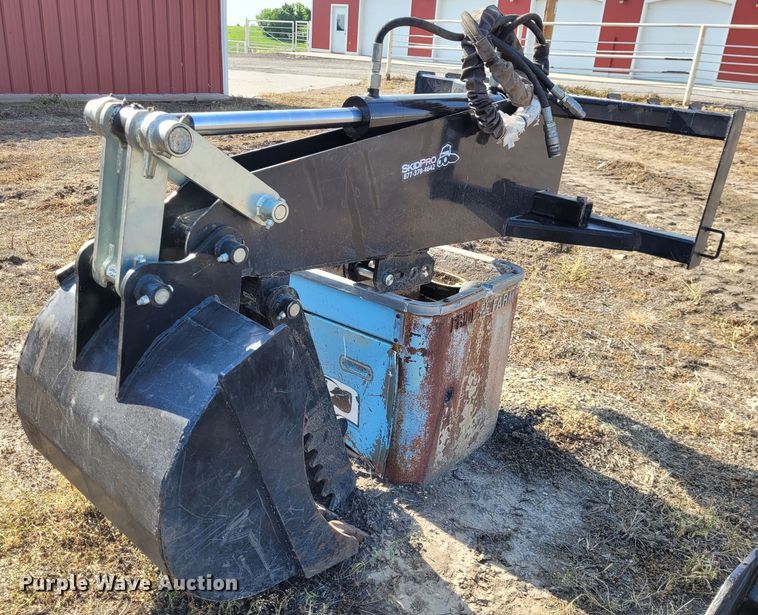 image for item NX9484 SkidPro 62210001  skid steer backhoe