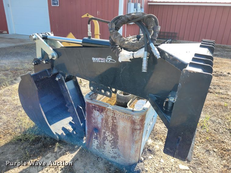 image for item NX9484 SkidPro 62210001  skid steer backhoe