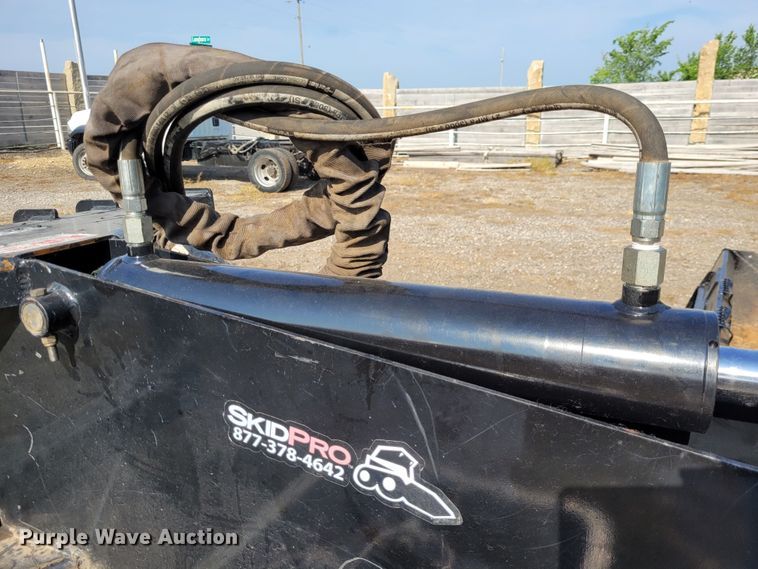 image for item NX9484 SkidPro 62210001  skid steer backhoe