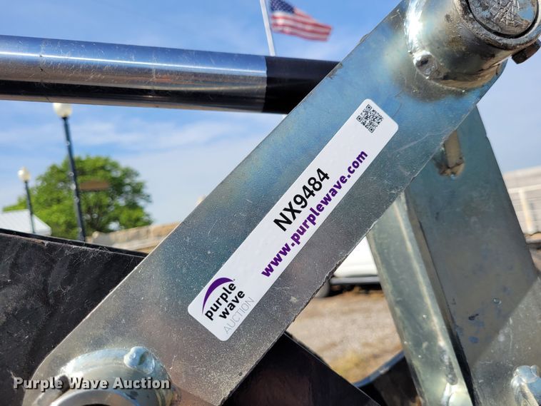 image for item NX9484 SkidPro 62210001  skid steer backhoe