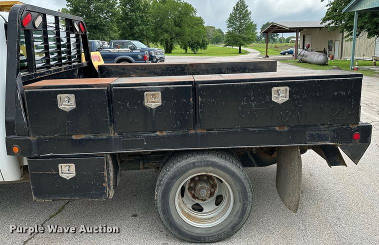 image for item DP3153 2013 GMC Sierra 3500HD  Crew Cab flatbed pickup truck