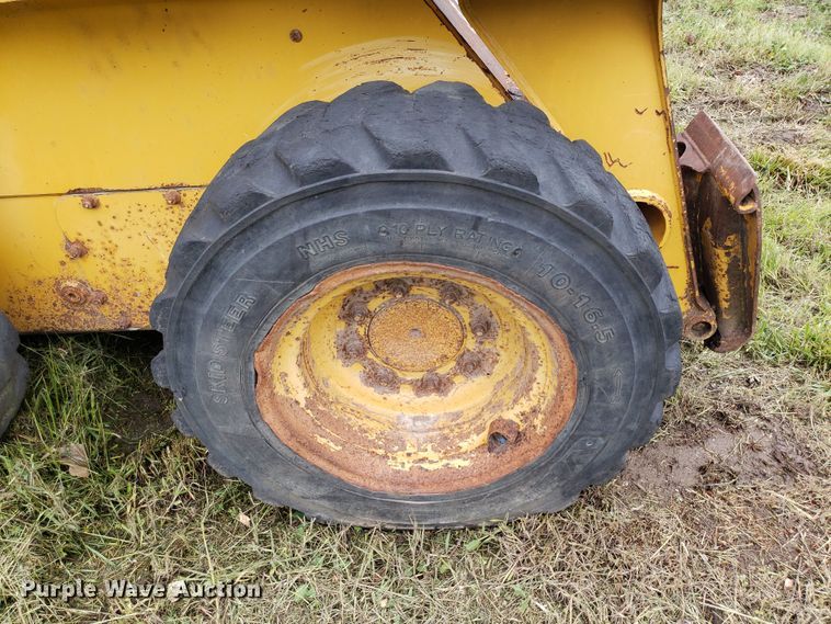 image for item DP7904 2004 John Deere 240 Series II  skid steer loader