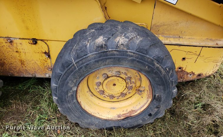 image for item DP7904 2004 John Deere 240 Series II  skid steer loader