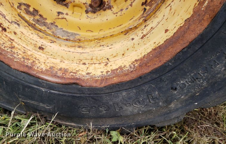 image for item DP7904 2004 John Deere 240 Series II  skid steer loader