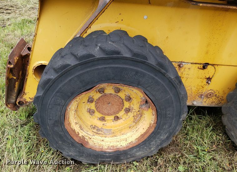 image for item DP7904 2004 John Deere 240 Series II  skid steer loader