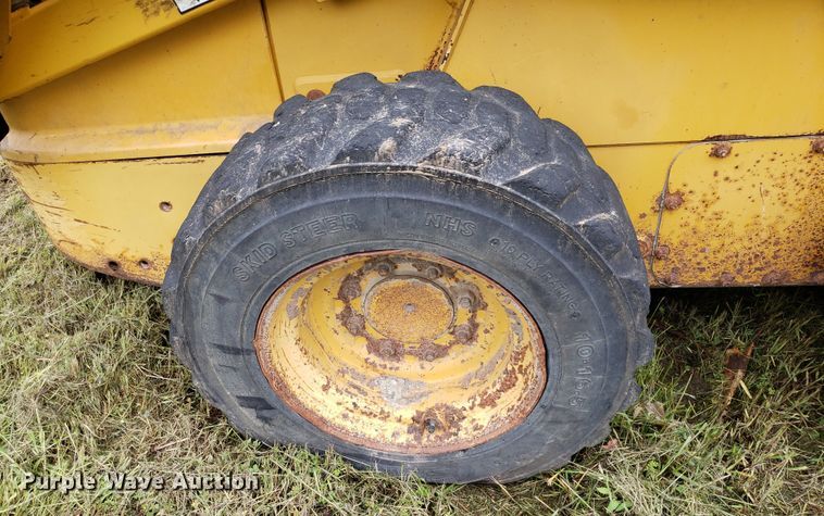 image for item DP7904 2004 John Deere 240 Series II  skid steer loader