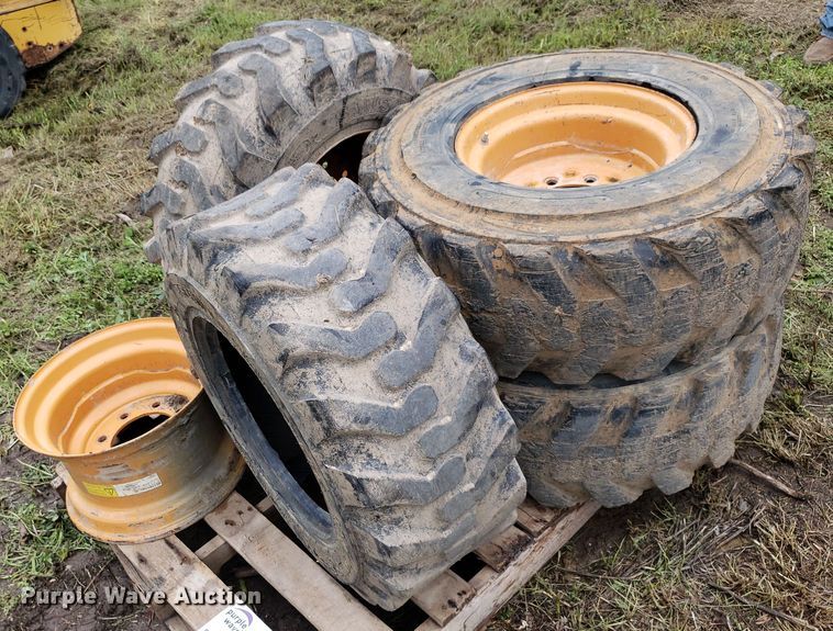 image for item DP7905 (4) 12-16.5 tires and wheels