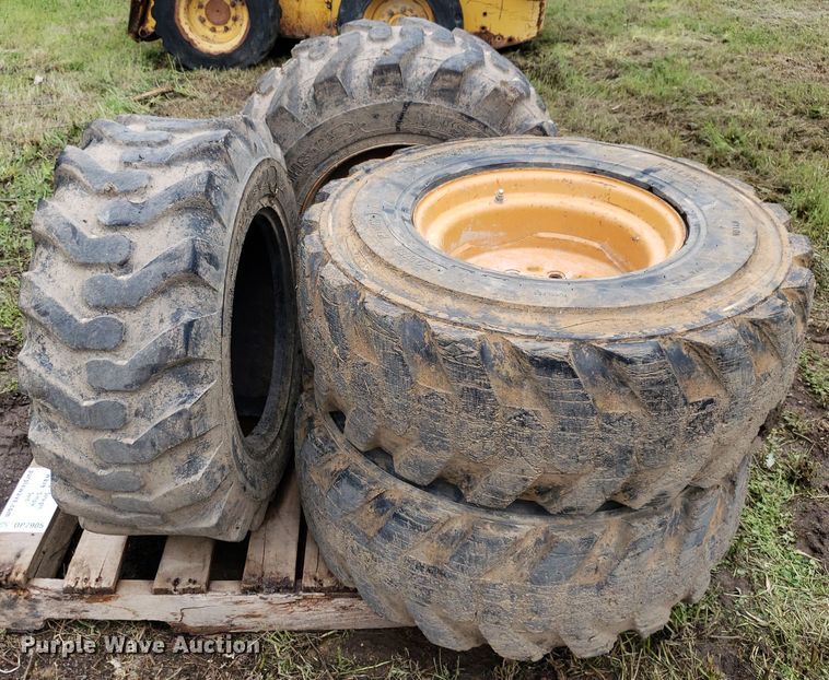 image for item DP7905 (4) 12-16.5 tires and wheels