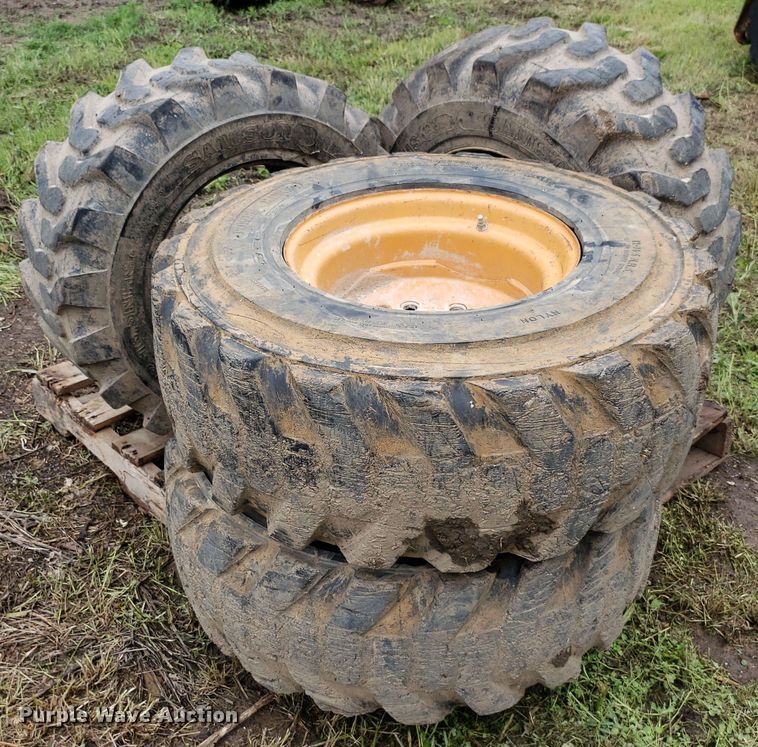 image for item DP7905 (4) 12-16.5 tires and wheels