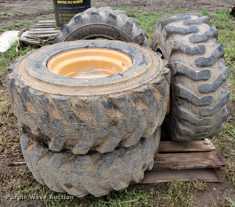 image for item DP7905 (4) 12-16.5 tires and wheels