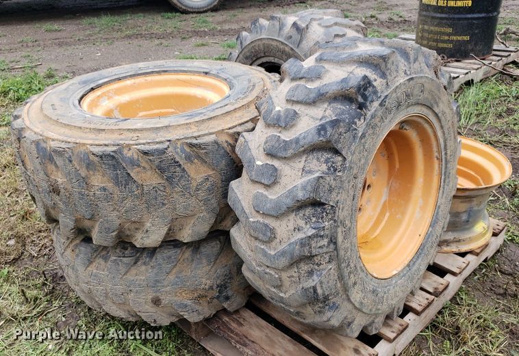 image for item DP7905 (4) 12-16.5 tires and wheels