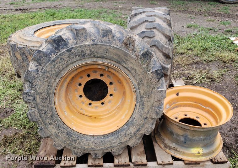 image for item DP7905 (4) 12-16.5 tires and wheels