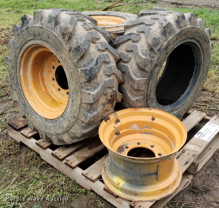 image for item DP7905 (4) 12-16.5 tires and wheels