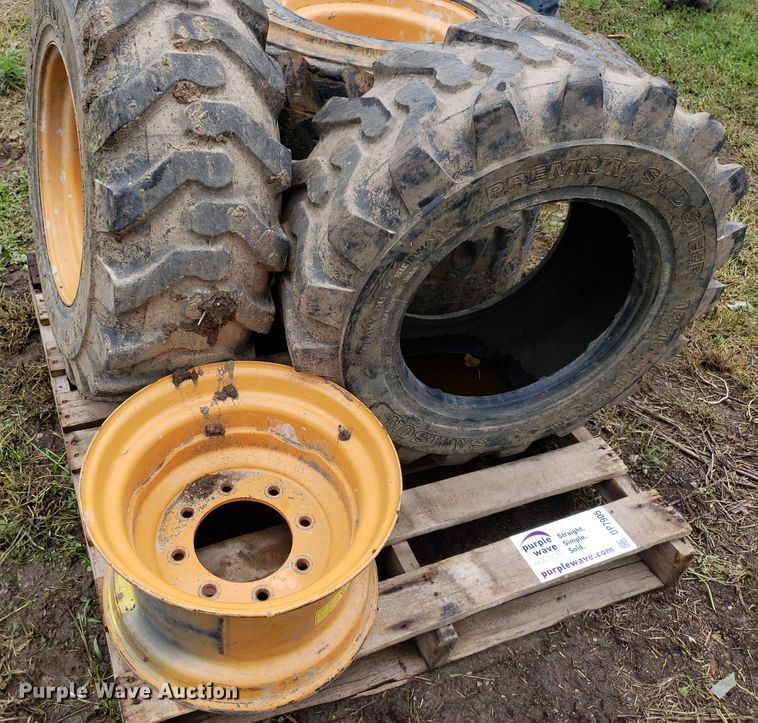 image for item DP7905 (4) 12-16.5 tires and wheels