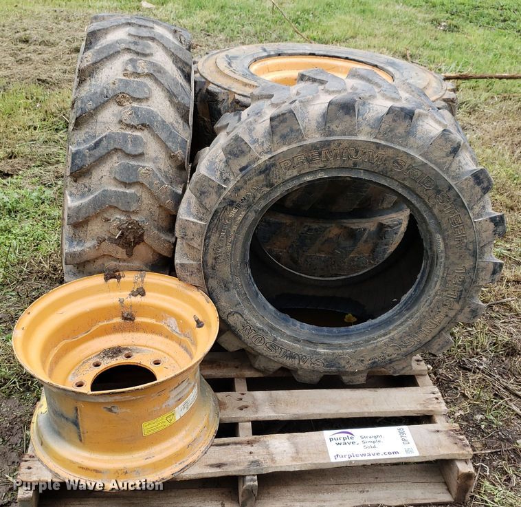 image for item DP7905 (4) 12-16.5 tires and wheels