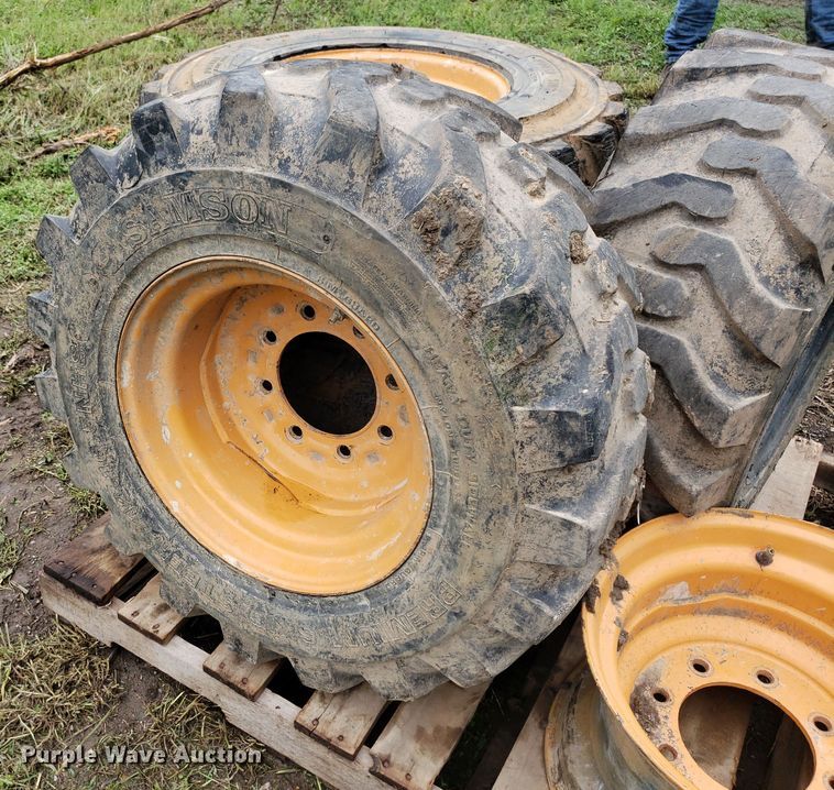 image for item DP7905 (4) 12-16.5 tires and wheels