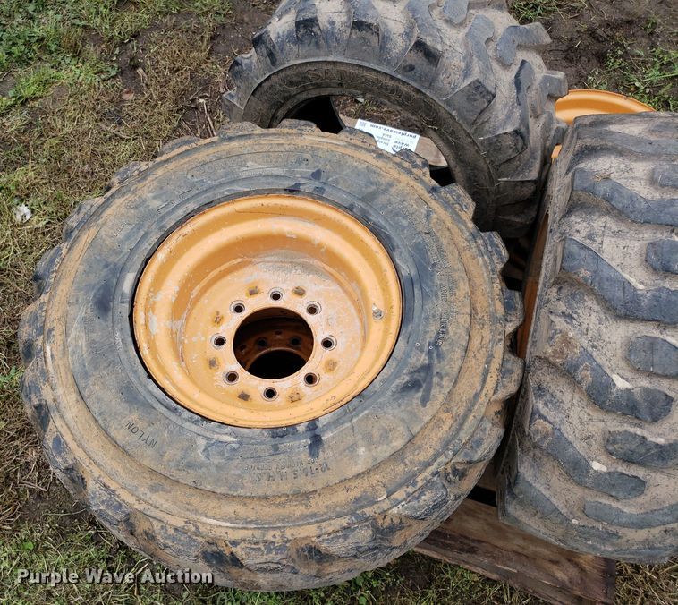 image for item DP7905 (4) 12-16.5 tires and wheels