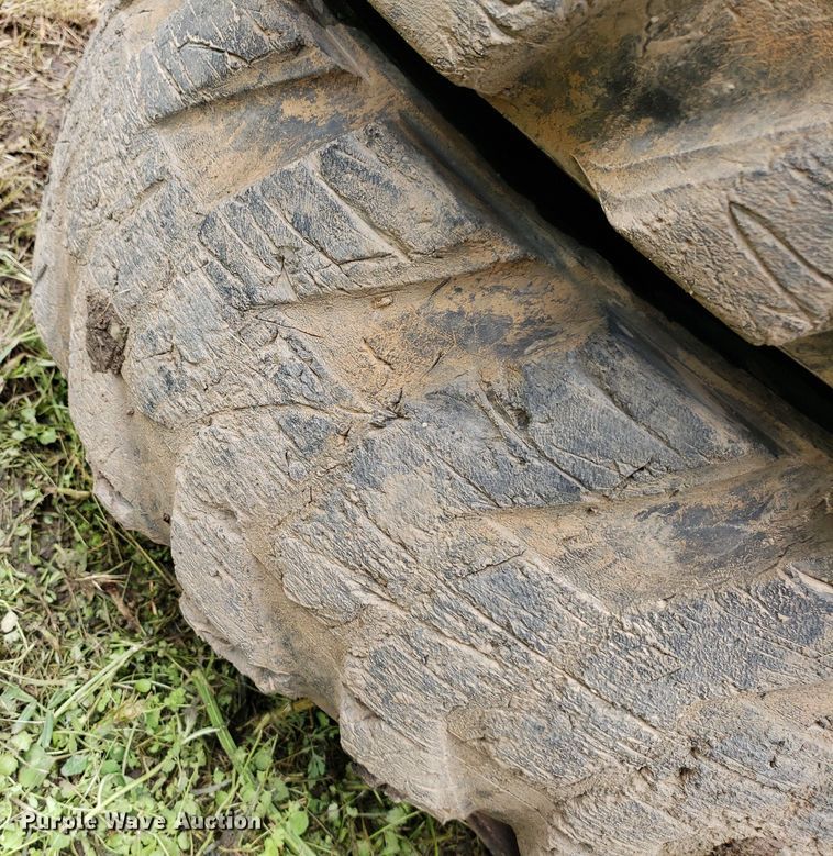 image for item DP7905 (4) 12-16.5 tires and wheels