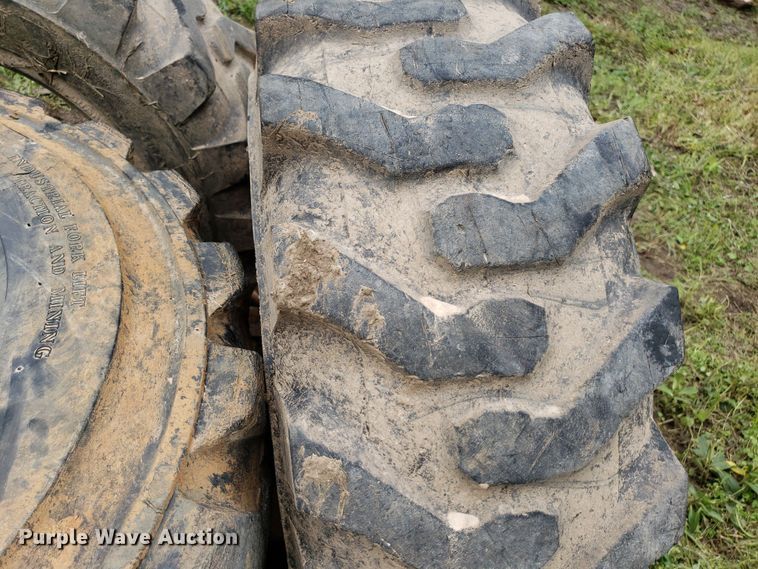 image for item DP7905 (4) 12-16.5 tires and wheels