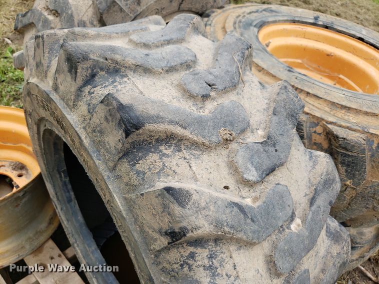 image for item DP7905 (4) 12-16.5 tires and wheels