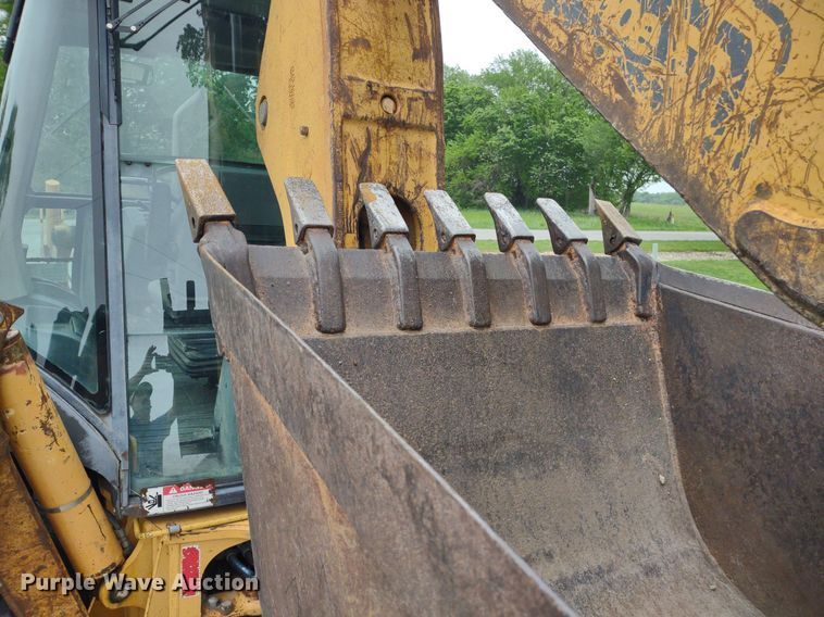 image for item DQ1720 1999 Case 580 Super L Series II  backhoe