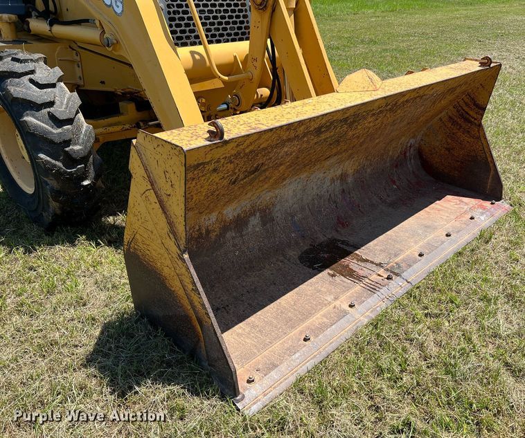 image for item DQ2055 2004 John Deere 310SG  backhoe