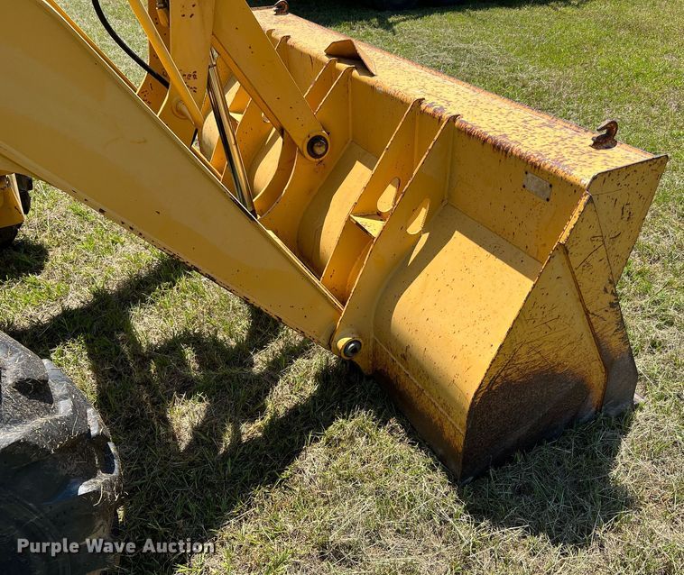 image for item DQ2055 2004 John Deere 310SG  backhoe