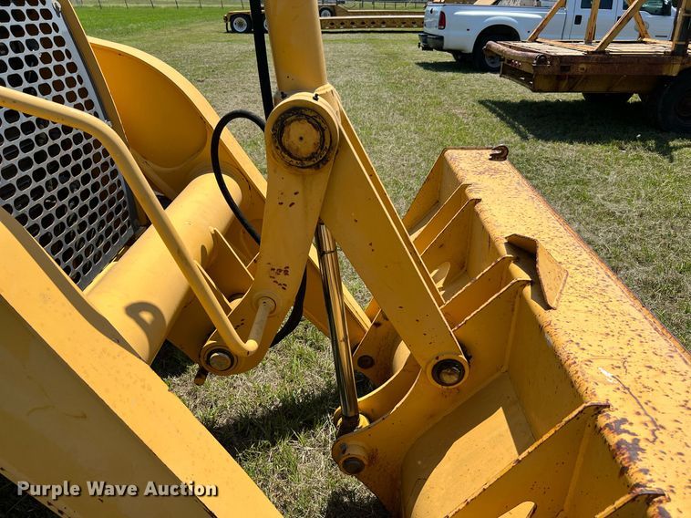 image for item DQ2055 2004 John Deere 310SG  backhoe