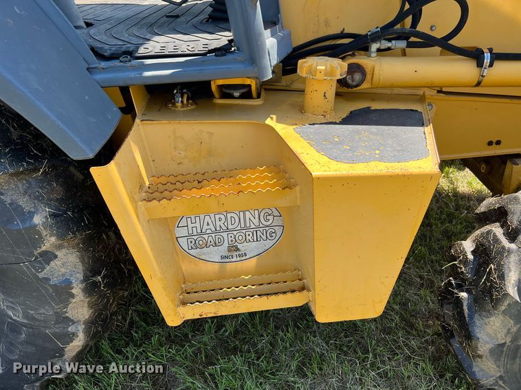 image for item DQ2055 2004 John Deere 310SG  backhoe