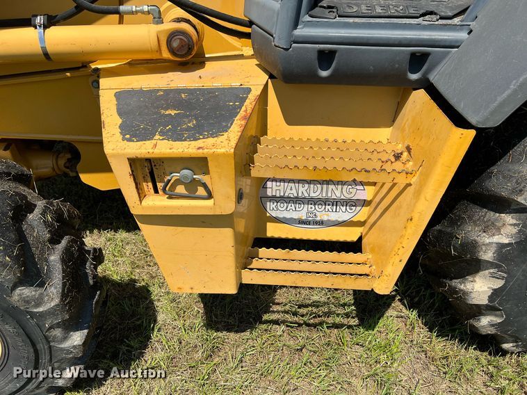 image for item DQ2055 2004 John Deere 310SG  backhoe