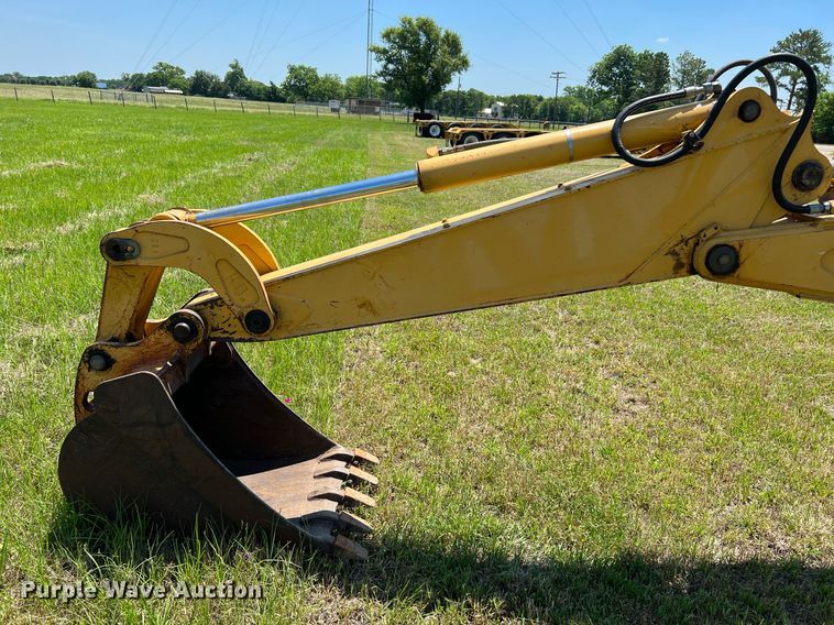 image for item DQ2055 2004 John Deere 310SG  backhoe