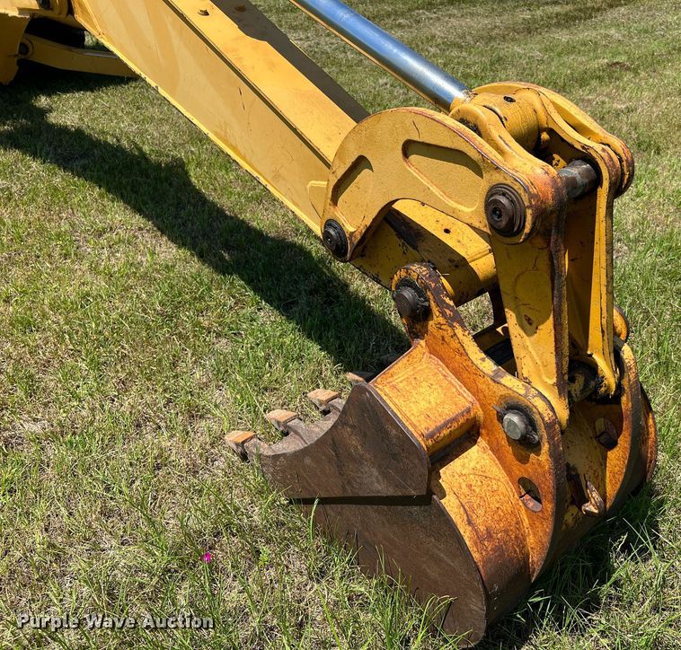 image for item DQ2055 2004 John Deere 310SG  backhoe