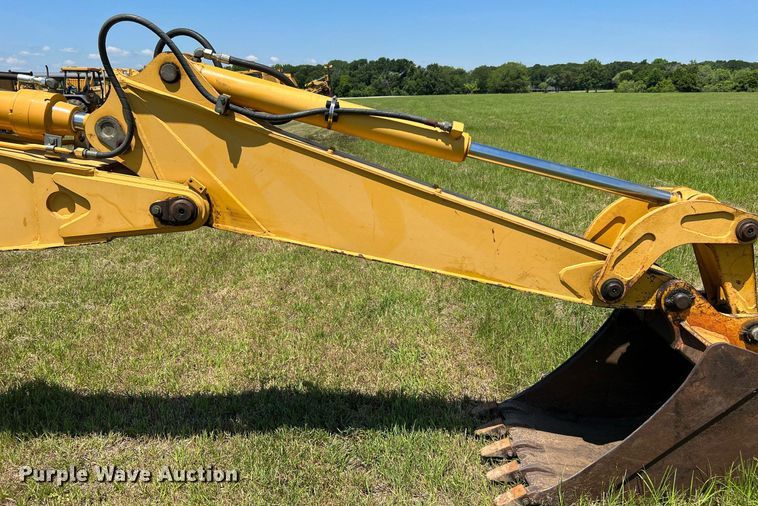 image for item DQ2055 2004 John Deere 310SG  backhoe