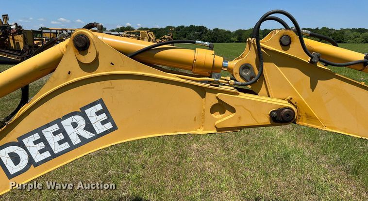 image for item DQ2055 2004 John Deere 310SG  backhoe