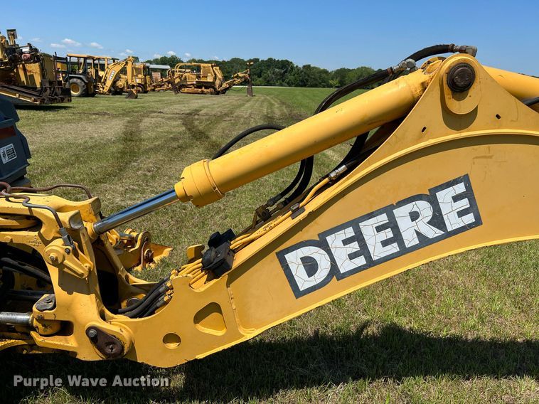 image for item DQ2055 2004 John Deere 310SG  backhoe