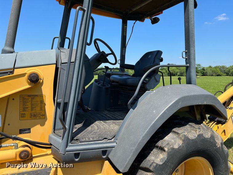 image for item DQ2055 2004 John Deere 310SG  backhoe