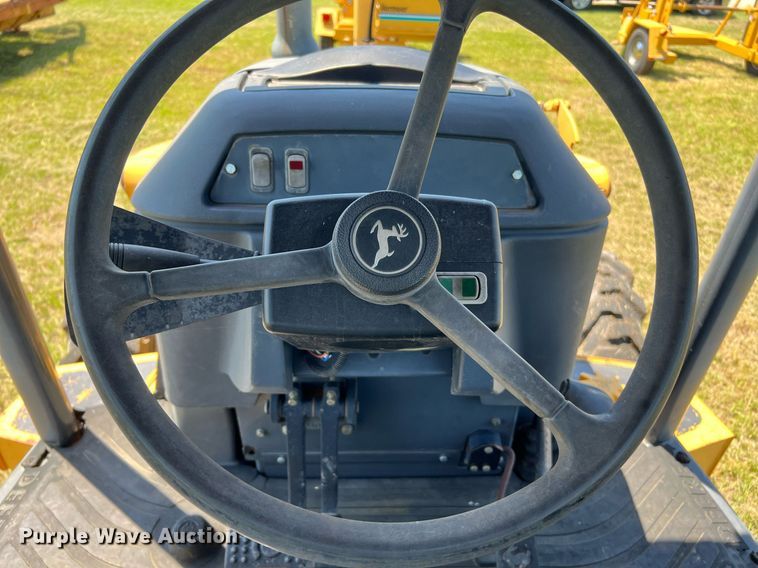 image for item DQ2055 2004 John Deere 310SG  backhoe